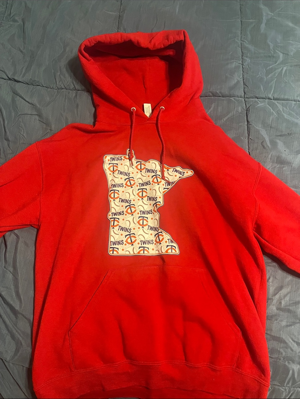Red Zip-Up Style Hooded Sweater with Minnesota Logo Motif